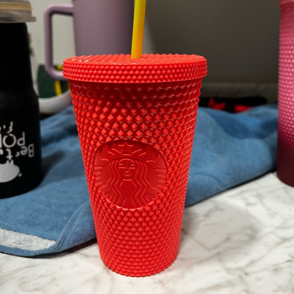 Coral studded Starbucks cup